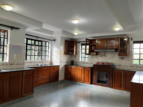 Kuchyň nebo kuchyňský kout v ubytování Nairobi Nomad Backpackers Hostel