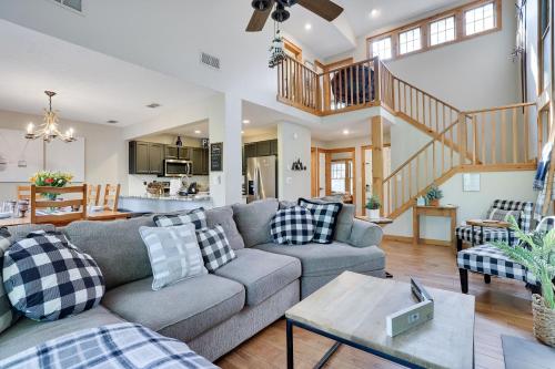 a living room with a couch and a table at Mountainview Vista 1 Mile To Water Park & Ski in Tannersville