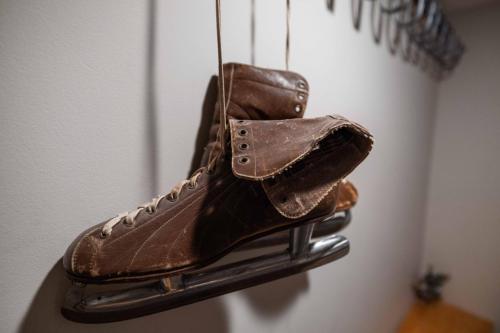a pair of brown shoes hanging on a wall at Mountainview Vista 1 Mile To Water Park & Ski in Tannersville