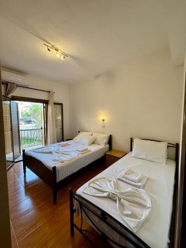 Ένα ή περισσότερα κρεβάτια σε δωμάτιο στο Villa Solari