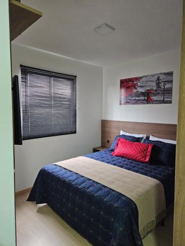 Postel nebo postele na pokoji v ubytování Studio 306, decorado com garagem e ar-condicionado