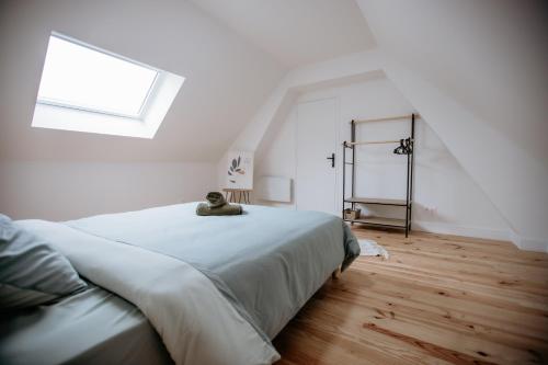 Postel nebo postele na pokoji v ubytování La Hacienda - Grande maison avec jardin