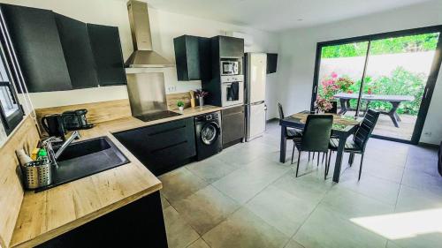 Instant Janin - Logement T3 climatisé plain pied avec jardin