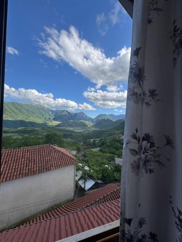 a view of the mountains from a roof at Bedena House in Kolonjë