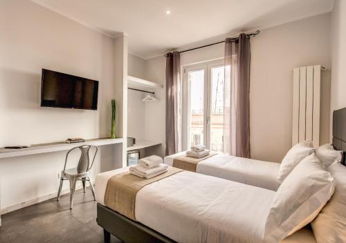 Postel nebo postele na pokoji v ubytování Floor 6 Boutique Rooms by DOT Suites