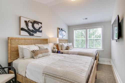 a bedroom with two beds and a window at Dock Access Pet-Friendly Lake Greenwood Gem! in Greenwood
