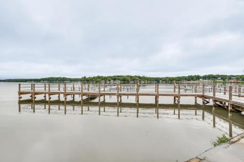 a dock on a body of water at Dock Access Pet-Friendly Lake Greenwood Gem! in Greenwood
