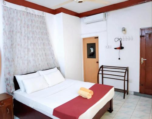 Postel nebo postele na pokoji v ubytování Chandi Mahal HomeStay