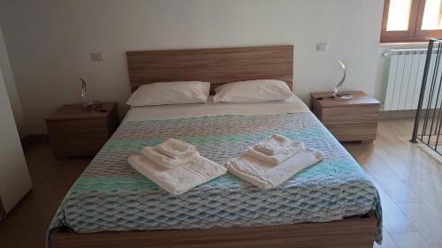 Postel nebo postele na pokoji v ubytování Casa la Matterella