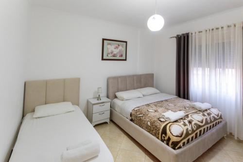 Foto Comfortable apartment next to the beach 3