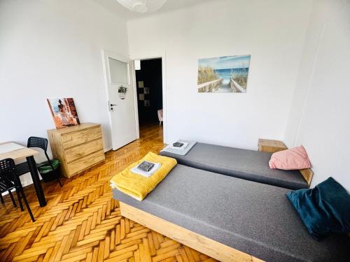Postel nebo postele na pokoji v ubytování Apartament Symphonia self check in 24h