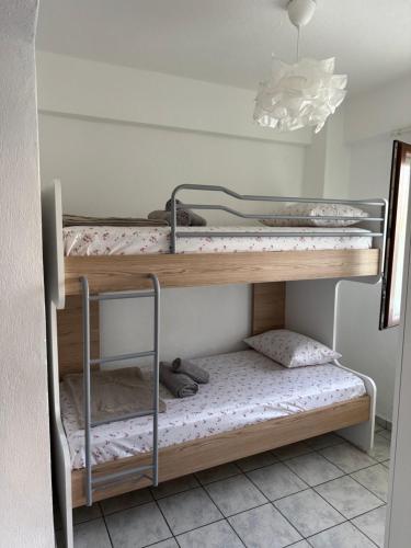 Postel nebo postele na pokoji v ubytování Alexandros