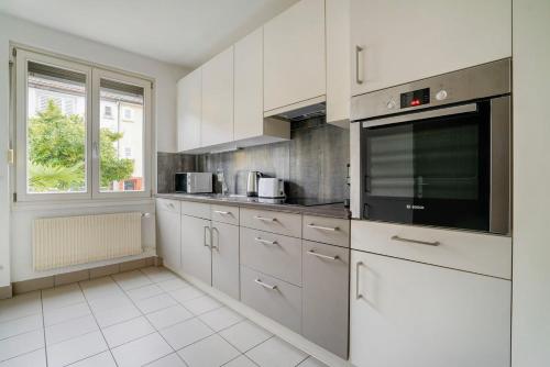Olive Suite Zürich - 90 qm, 3 Schlafzimmer, Balkon & moderne Küche