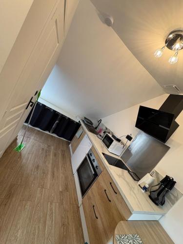 Il dispose d'une cuisine avec du parquet. dans l'établissement L 'escapade amiénoise 2, à Amiens