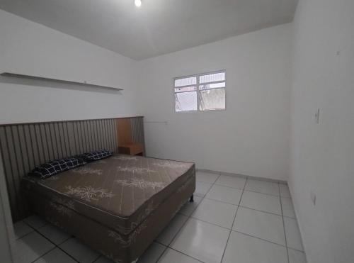 Postel nebo postele na pokoji v ubytování Apartamento temporada