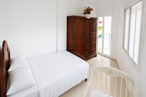 Postel nebo postele na pokoji v ubytování DAR BASATIN of Tangier