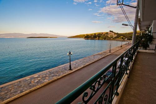a view of a body of water from a balcony at Hercules in Amaliápoli