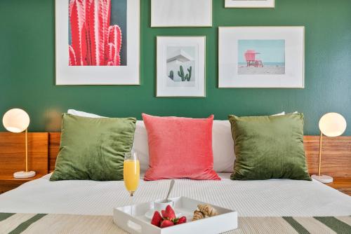 a living room with a couch with a tray of fruit at MVR - Elevate Your Stay with Stunning Ocean Views in Miami