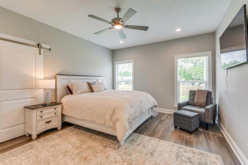 a bedroom with a bed and a ceiling fan at Modern Family Home with Spacious Yard in Milton in Ferry Pass
