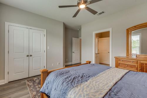 a bedroom with a bed and a ceiling fan at Modern Family Home with Spacious Yard in Milton in Ferry Pass