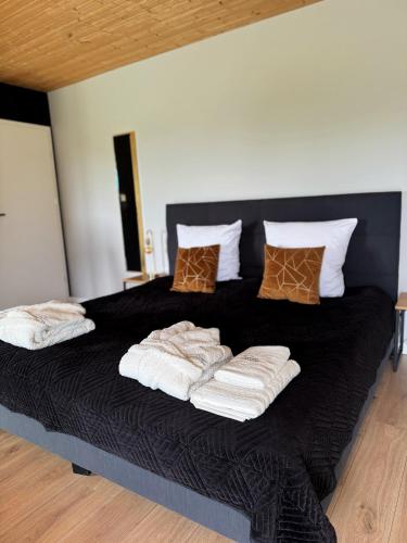 Postel nebo postele na pokoji v ubytování Resort Mielenko