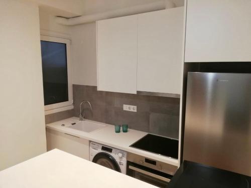 Η κουζίνα ή μικρή κουζίνα στο Modern Studio for 2 persons in the Heart of Athens