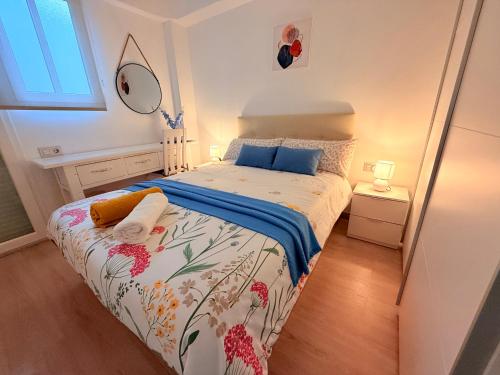 En eller flere senge i et værelse på Apartamento Luna