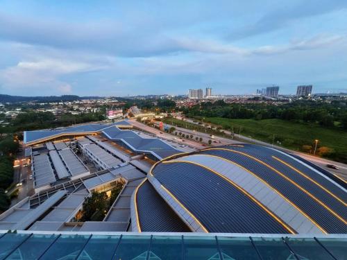 an overhead view of a building with blue roofs at Sunsuria Luxury Muji 3BR suit for 6-8px in Shah Alam