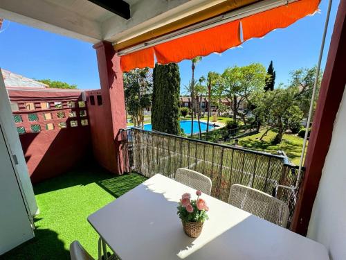 Apartmento en La Barrosa con piscina