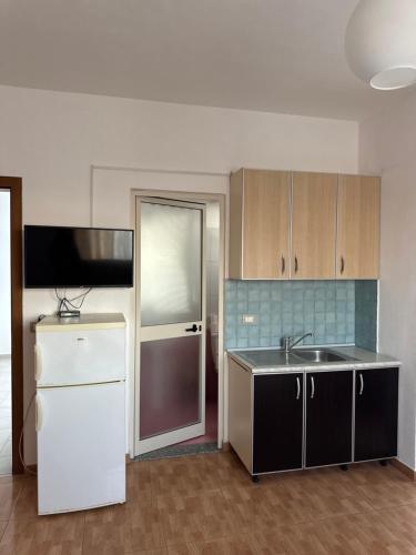 Kuchyň nebo kuchyňský kout v ubytování GuestHouse Cami