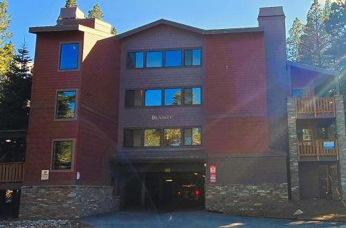 a red brick building with a clock tower at Eagle Summit Collection in Mammoth Lakes