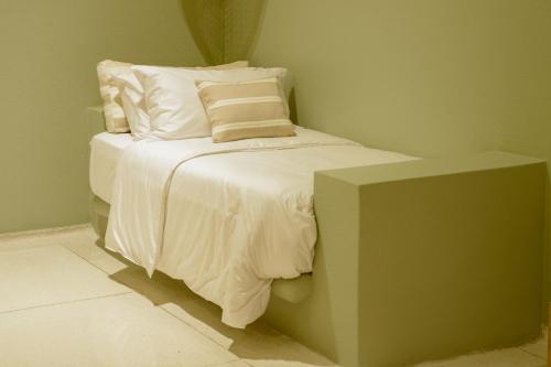 Ένα ή περισσότερα κρεβάτια σε δωμάτιο στο Terrazas Hotel Boutique