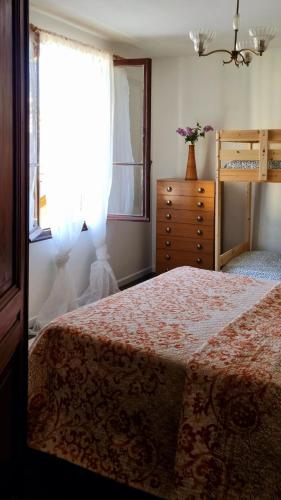 Ένα ή περισσότερα κρεβάτια σε δωμάτιο στο La casa di Elma