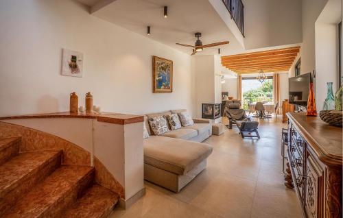 a living room with a couch and a table at Can Sivella Groc in Sóller