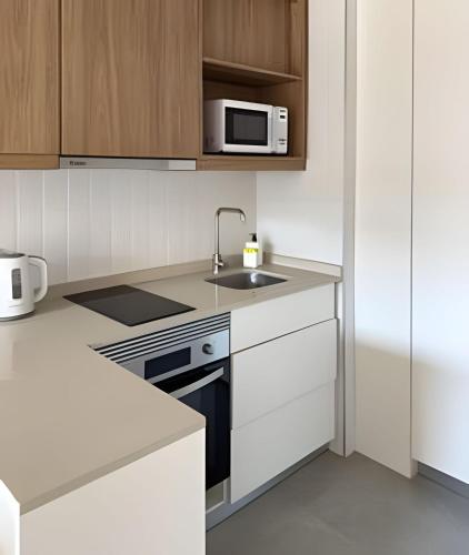 Dapur atau dapur kecil di Live Suites