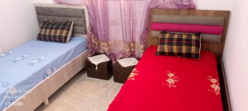 Ein Bett oder Betten in einem Zimmer der Unterkunft Dar MORTADA TATAOUINE
