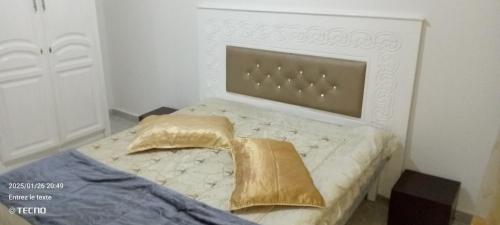 Ein Bett oder Betten in einem Zimmer der Unterkunft Dar MORTADA TATAOUINE