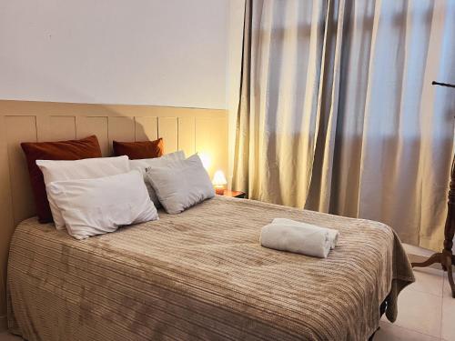 Letto o letti in una camera di VISTA PARA MAR - Guarapari ES