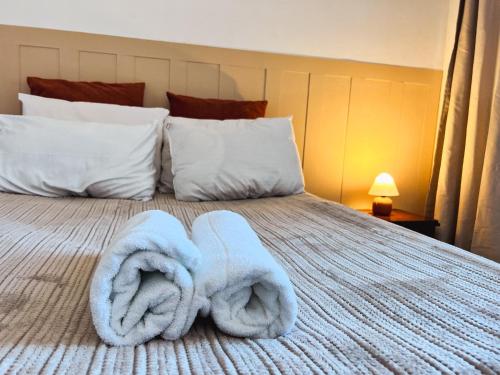 Letto o letti in una camera di VISTA PARA MAR - Guarapari ES