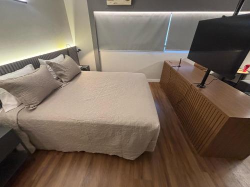 Кровать или кровати в номере Hotel Vila Mariana Ibirapuera Com Garagem 409