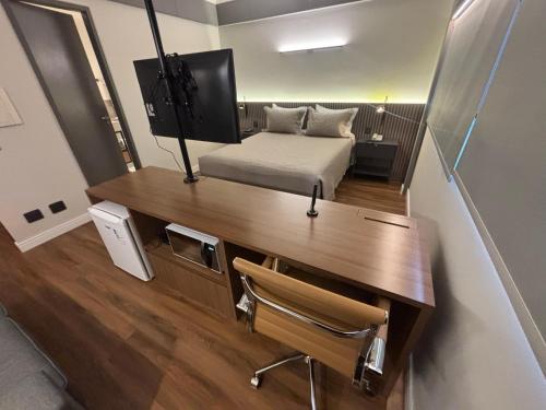 Кровать или кровати в номере Hotel Vila Mariana Ibirapuera Com Garagem 409
