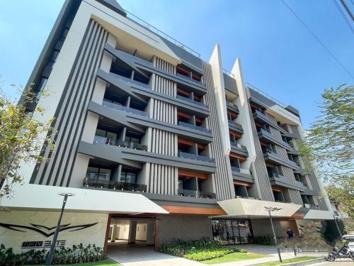 a large apartment building with at Dpto Home Office - Smart - Piscina - Cowork - Gym in Santa Cruz de la Sierra