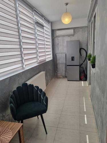 Ruang duduk di Golden Apartment - Militari Residence Bucharest