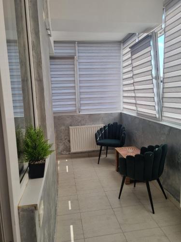 Ruang duduk di Golden Apartment - Militari Residence Bucharest