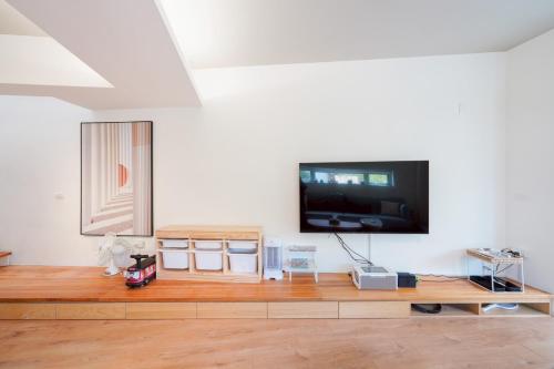 Dreaming Homestayにあるテレビまたはエンターテインメントセンター