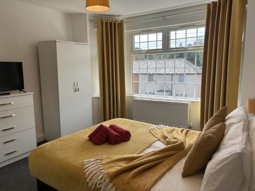 Voodi või voodid majutusasutuse Boardlands House 3 Bed home toas