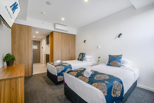 Cama o camas de una habitación en The Park OASIS Burwood