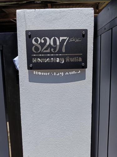 a refrigerator with a sign on the side of it at Homestay Aulia, Dungun, Terengganu in Dungun