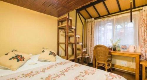 Ένα ή περισσότερα κρεβάτια σε δωμάτιο στο The Courtyard Suzhou Inn Hemu Branch