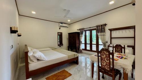 Cama o camas de una habitación en Mendis Villa